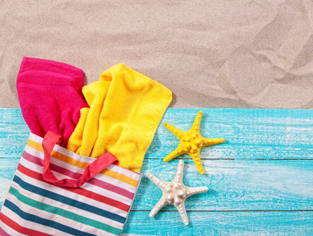 Photo de la dernière actualité - Vacances d’été : comment bien nettoyer son linge de plage ?